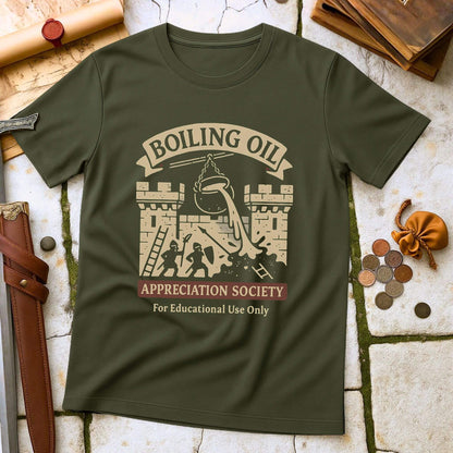 Military Green t-shirt with 'Boiling Oil Appreciation Society' graphic on a stone surface with historical props.