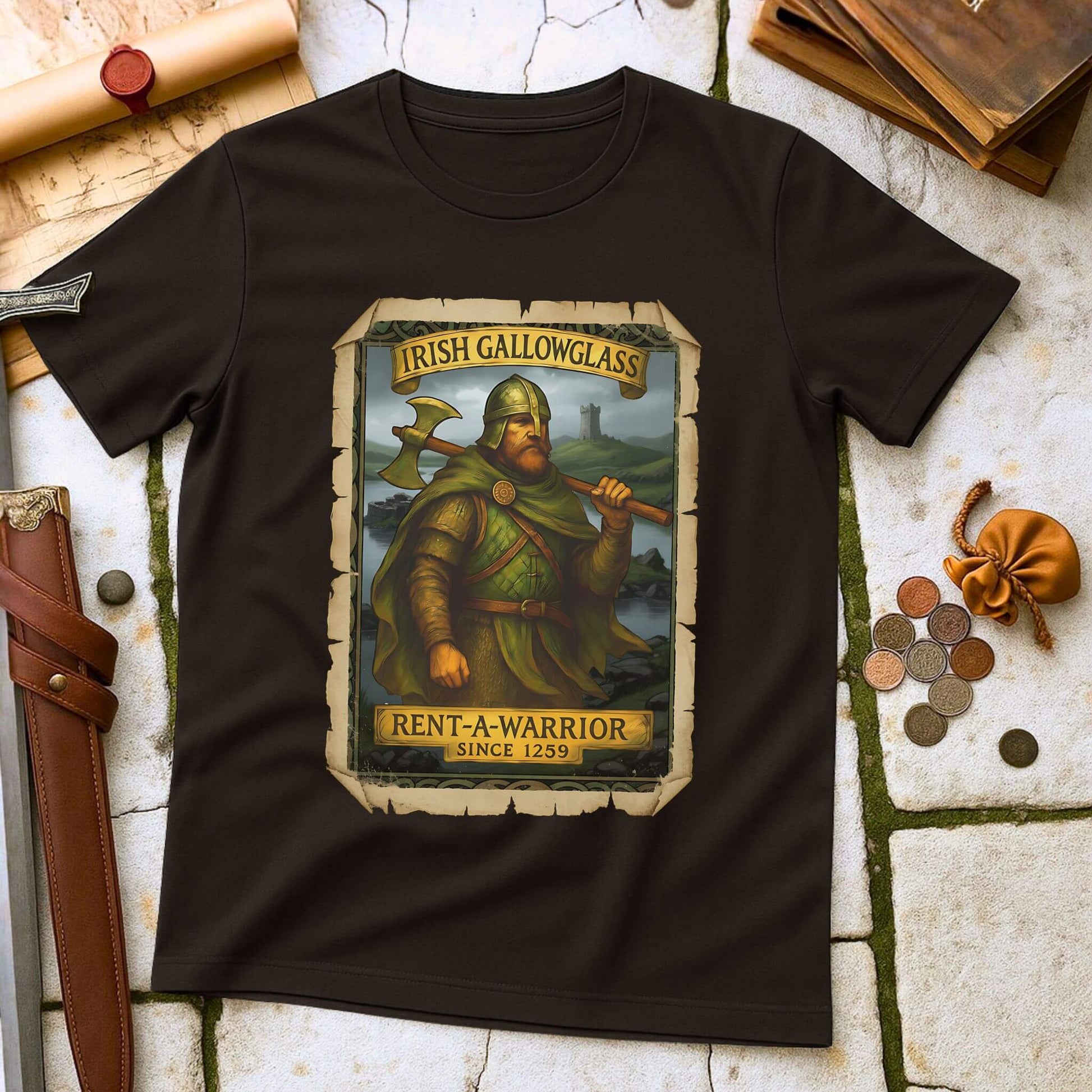 Dark Chocolate t-shirt with a graphic of a Irish Gallowglass warrior and text on a stone surface with historical props. 