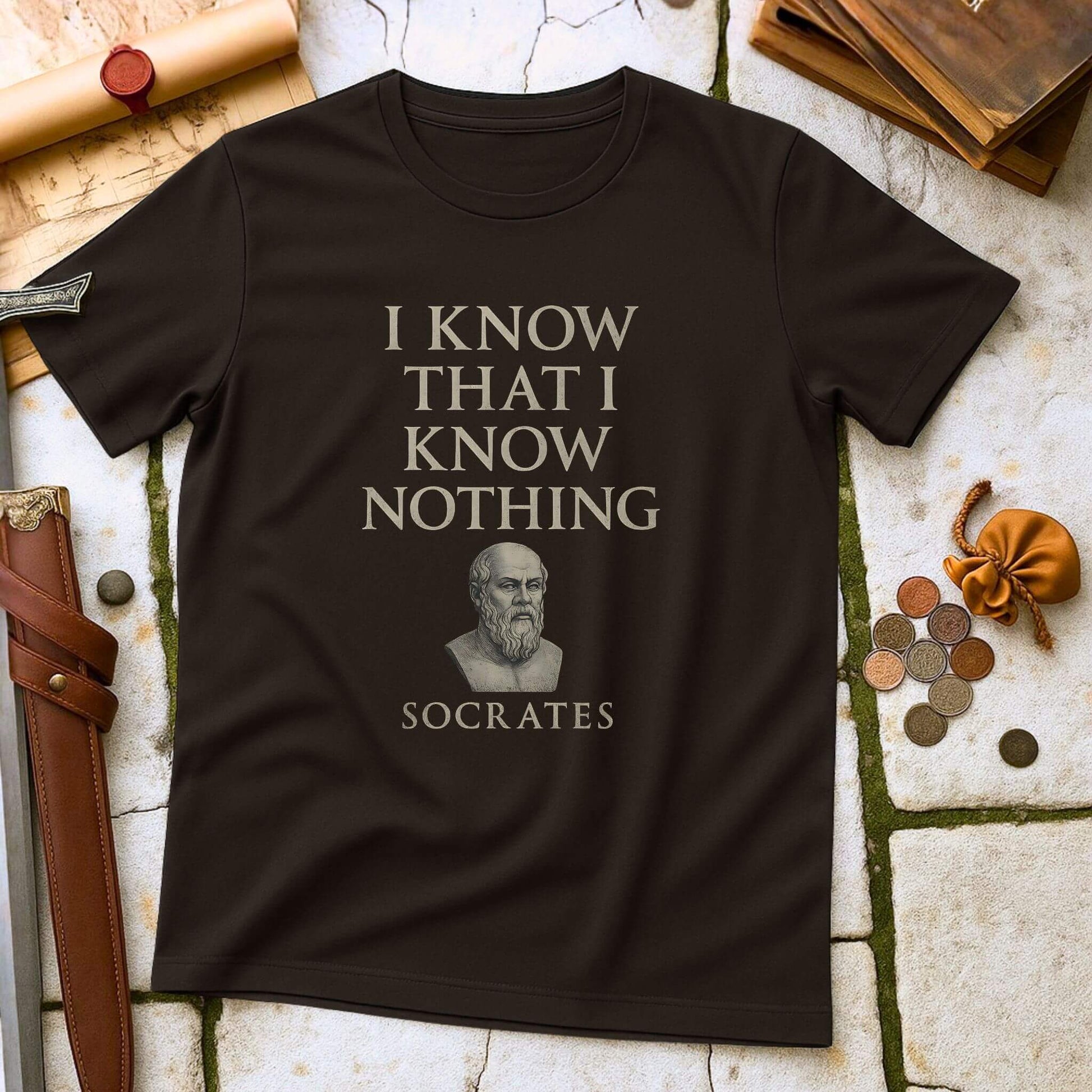 Dark Chocolate t-shirt with 'I Know That I Know Nothing' Socrates quote on a textured surface with classical items.