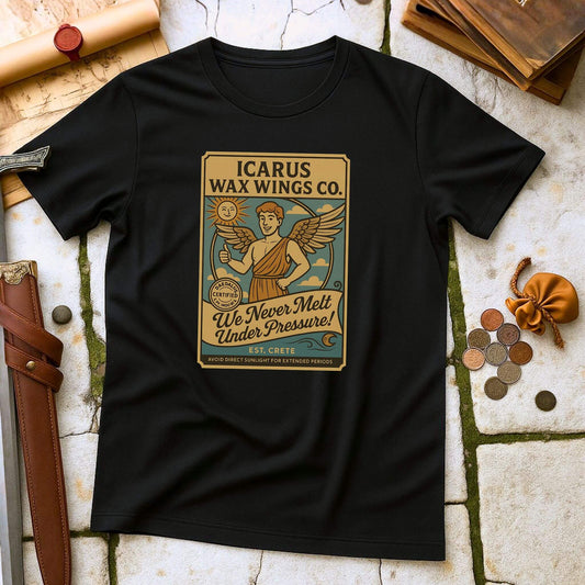 Black t-shirt with 'Icarus Wax Wings Co.' graphic on a textured surface with books and coins.