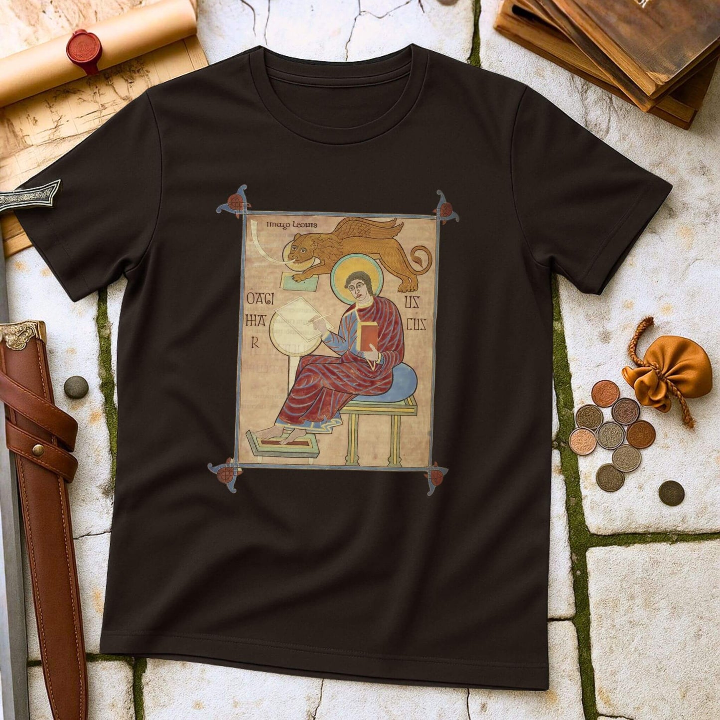 Dark Chocolate t-shirt with a medieval-style illustration on a stone surface with coins and books.