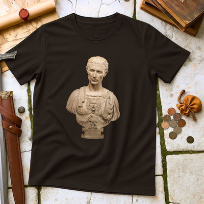 Julius Caesar Roman Emperor T-Shirt on a stone surface with historical items.