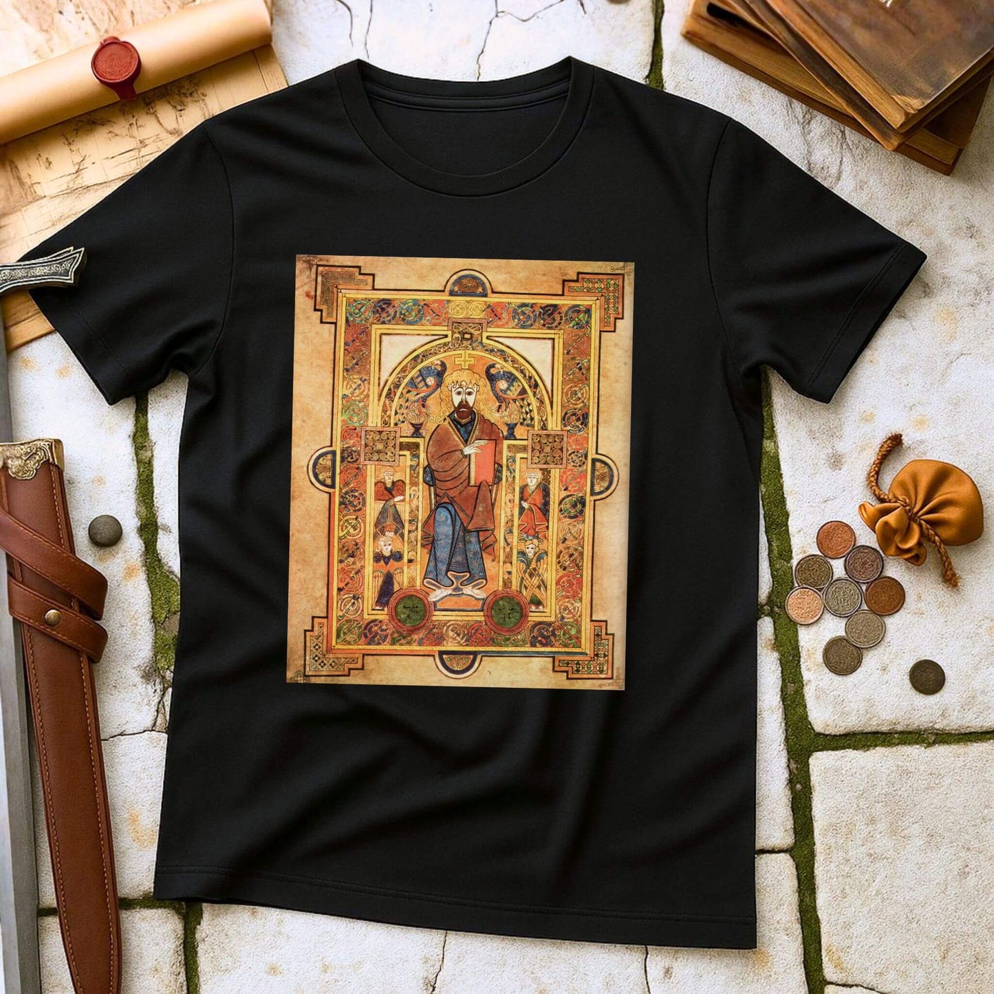 Manuscript T-Shirt Black with a decorative design of a figure in a frame on a textured surface.