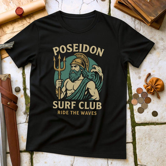 Black t-shirt with Poseidon graphic and 'Poseidon Surf Club Ride the Waves' text on a stone surface.