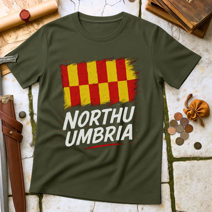 Military Green t-shirt with a red and yellow checkered flag and 'NORTHUMBRIA' text on a stone surface.