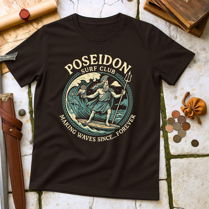 Dark Chocolate t-shirt with Poseidon Surf Club graphic on a textured surface with coins and a belt.