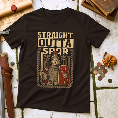 Dark Chocolate t-shirt mockup featuring a 'Straight Outta SPQR' design with a Roman centurion holding a gladius sword and shield, surrounded by laurel wreaths, laid flat on a stone and leather historical background